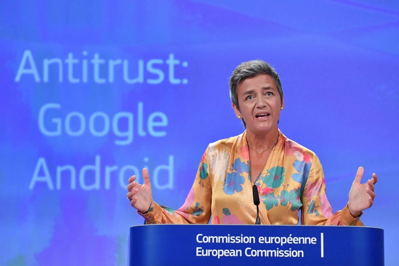EU Commissioner Margrethe Vestager speaks at a podium.